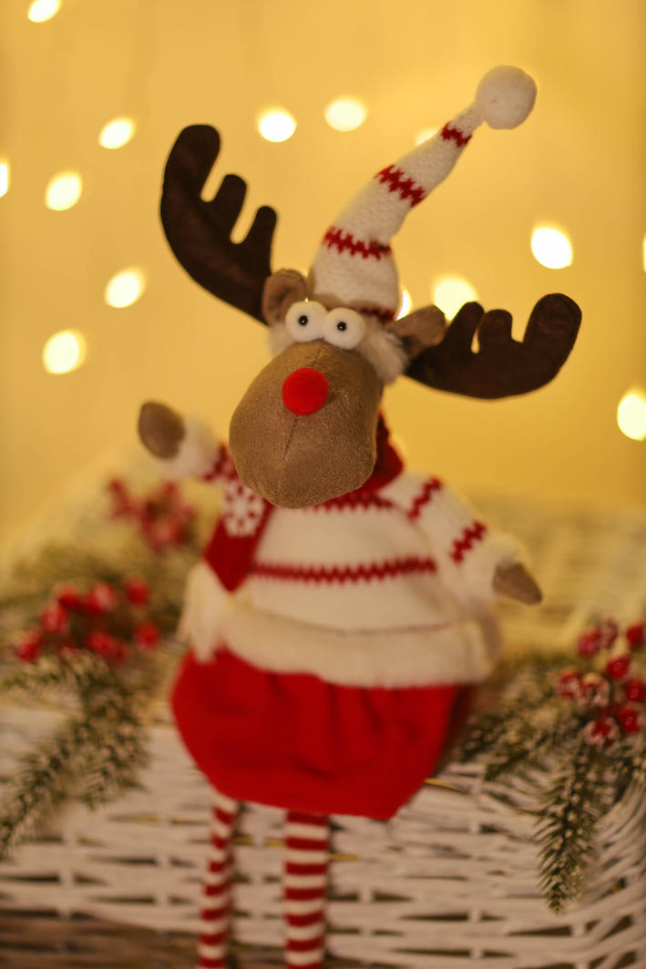 Sitting Reindeer w/ Red & White Sweater
